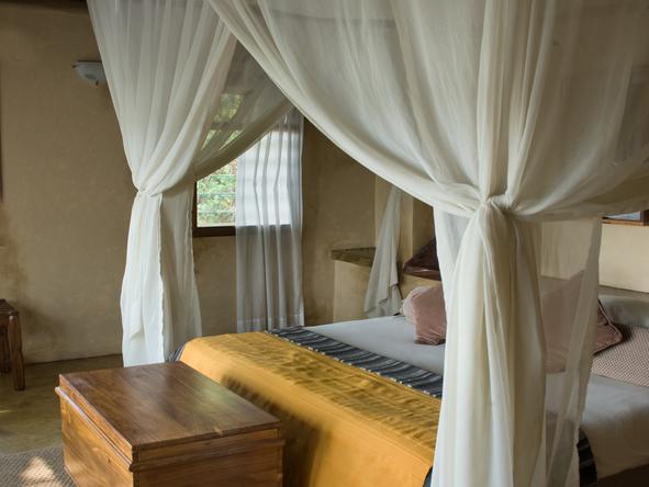 Susuwe Island Lodge - bedroom